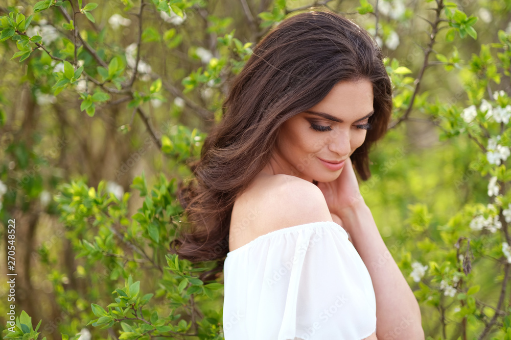 Natural brunette at spring time looking down. Natural brunette at spring time looking down.