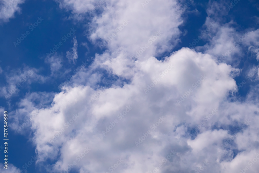 Clouds on a blue sky on a summer day Clouds on a blue sky on a summer day
