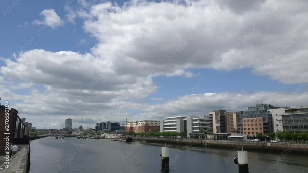 Panning shot over the River Liffey would buildings to the right-hand side. Panning shot over the River Liffey would buildings to the right-hand side.