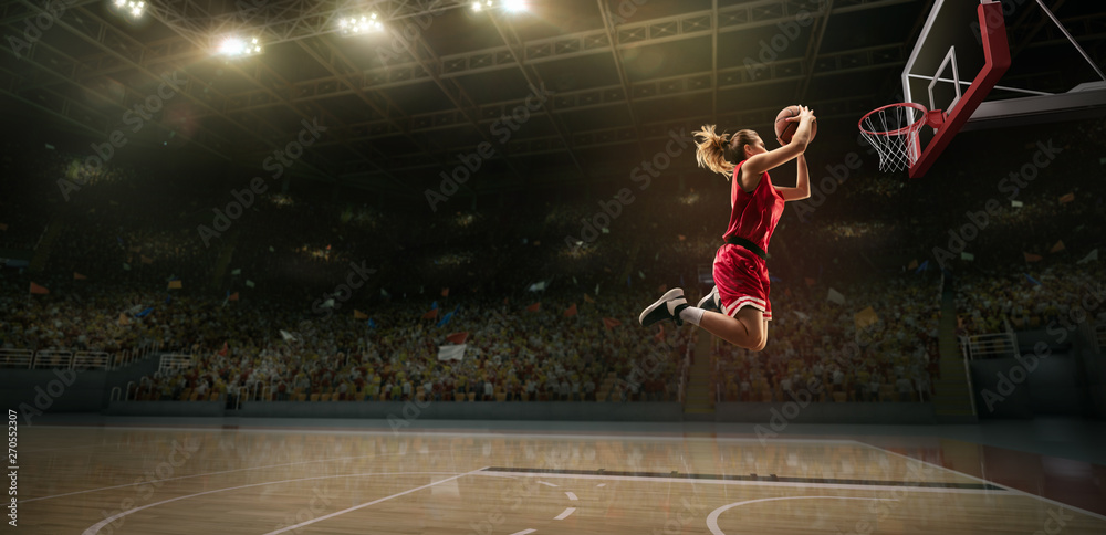 female basketball player dunking
