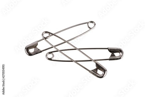 Safety pin brooch made from metal stainless isolate on white