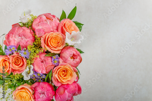 Bouquet of fresh pink peonies and roses. Card Concept, pastel colors, close up image © manuta