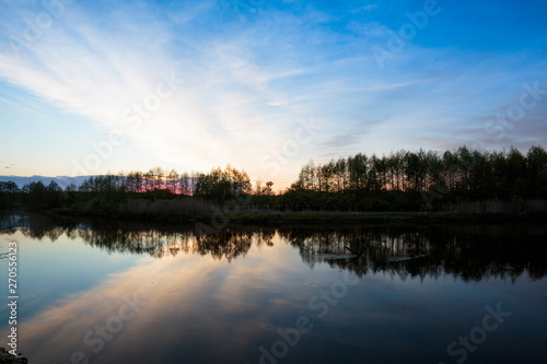 sunset over the lake © Александр Богукалец