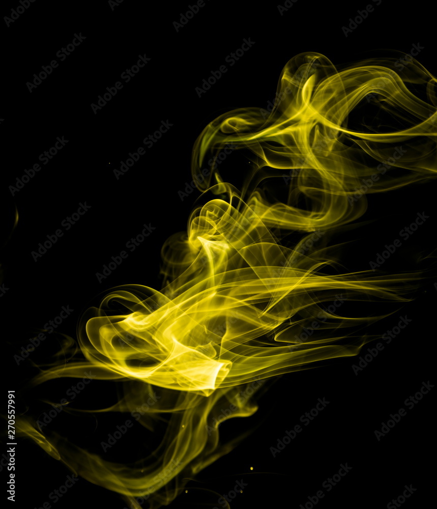 Yellow smoke on black background Yellow smoke on black background