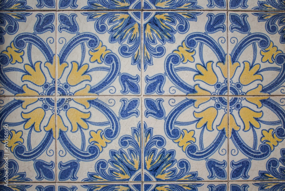 Traditional Portuguese ceramic tiles wall. Typical exterior decoration on house in Portugal.