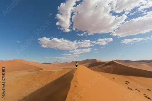 women walking on sand dune 45, Namib desert