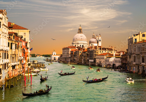 Venice, the Grand canal, the Cathedral of Santa Maria della Salute and gondolas with tourists, top view © vesta48