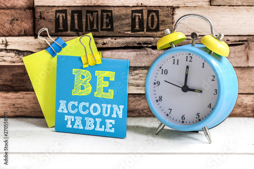 Post-it & alarm clock : Time to be accountable photo