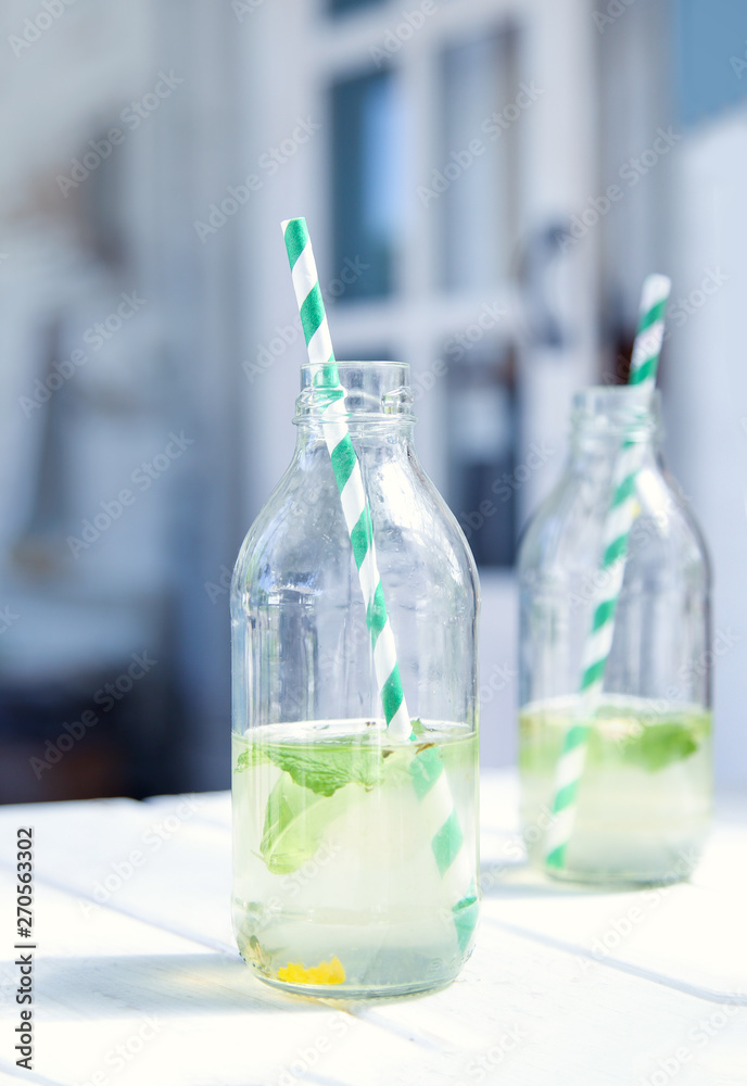 Two bottles with lemonade. Two bottles with lemonade.