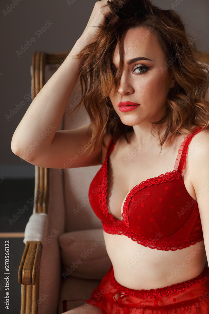 Sexy brunette woman posing wearing stylish red underwear Stock Photo Adobe Stock