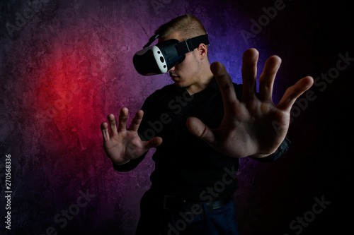 Portrait of young man with 3D virtual reality glasses 