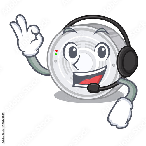 With headphone smoke detector above the cartoon table