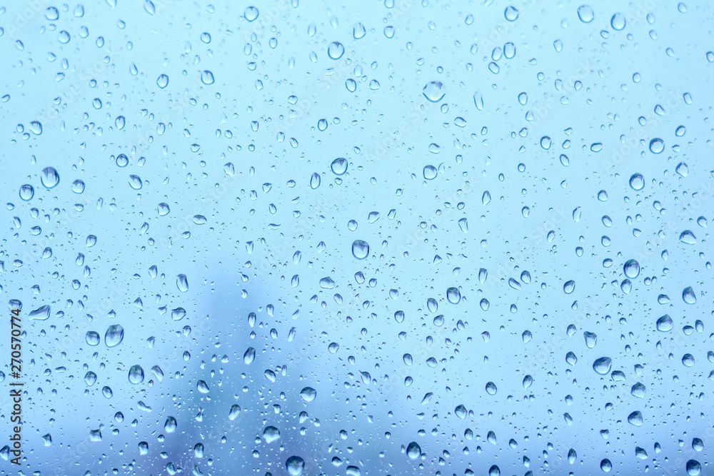 Rain drops on window. Natural water drops on glass. Selective focus Rain drops on window. Natural water drops on glass. Selective focus
