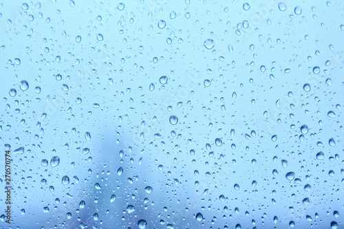 Rain drops on window. Natural water drops on glass. Selective focus