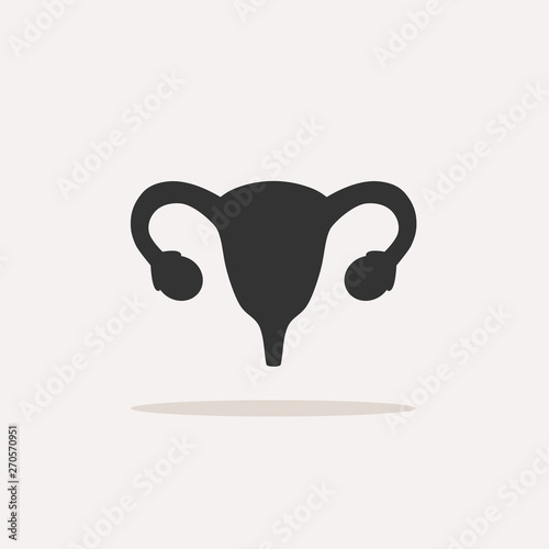 Uterus human icon with shadow on beige background