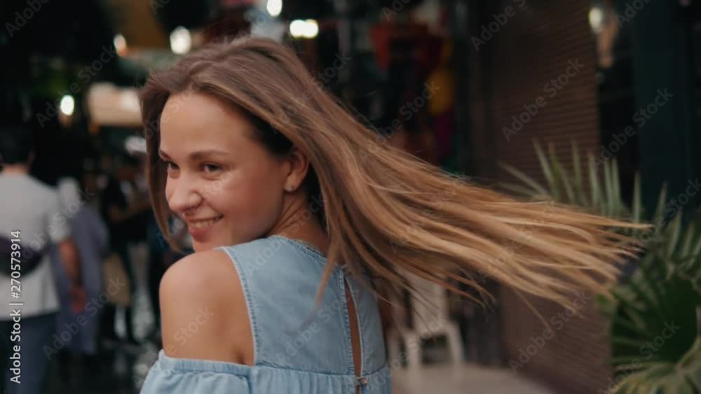 Happy beautiful tourist woman in fashionable summer dress enjoying in MARRAKECH Marocco arabian market, traditional old arabic place Happy beautiful tourist woman in fashionable summer dress enjoying in MARRAKECH Marocco arabian market, traditional old arabic place