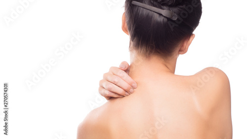 Woman using hand massage painful neck. And nape. red color highlight at neck , neck muscles isolated on white background. health care. photo