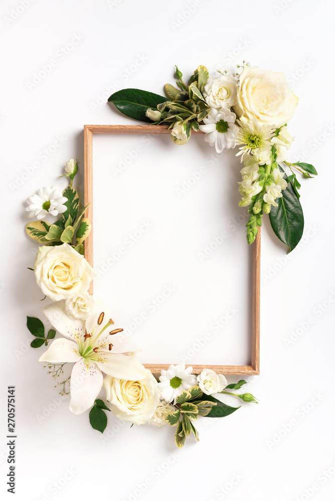 Frame of rose, lily, gerbera flowers over white background. Valentines day, Woman day concept. Spring or summer banner with copy space. Banner