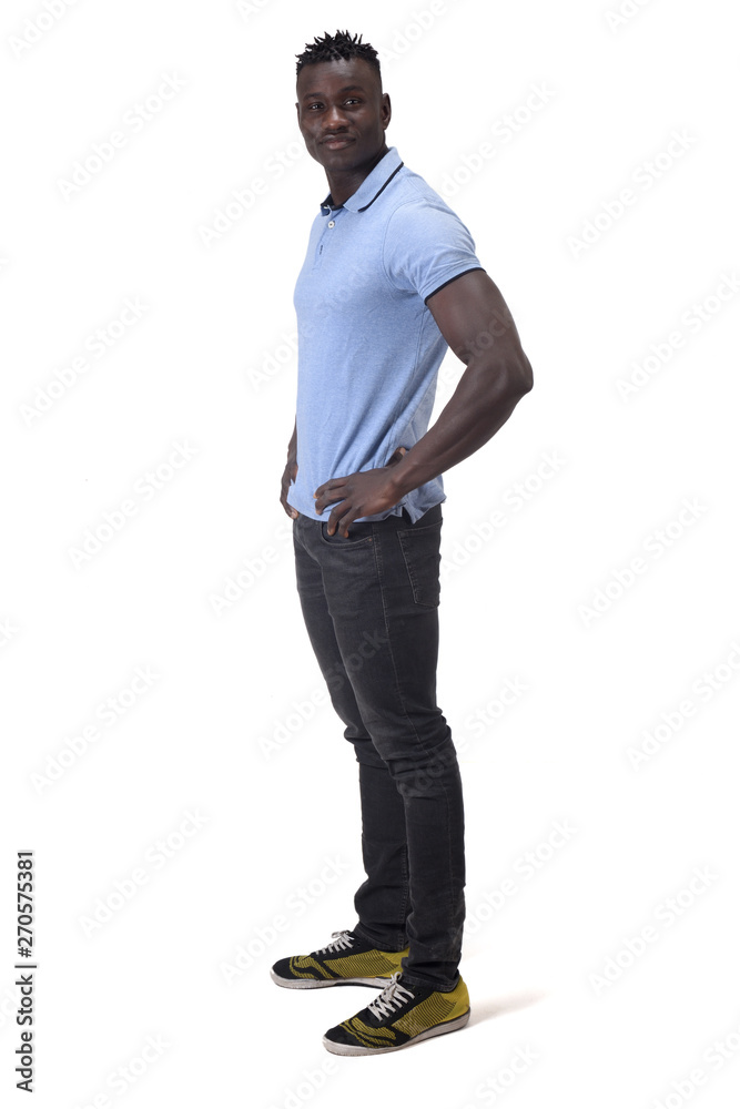 Fototapeta premium full portrait of an african man with his hands on waist