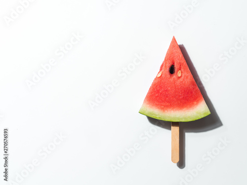 watermelon popsicle. Water melon slice on white background. Top view or flat lay. Summer  healthy diet concept. Copy space for text. Isolated on white background