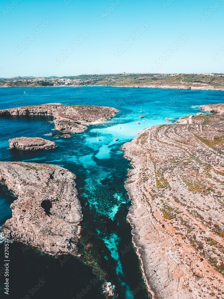 A captivating drone shot of the Blue Lagoon on Comino Island.