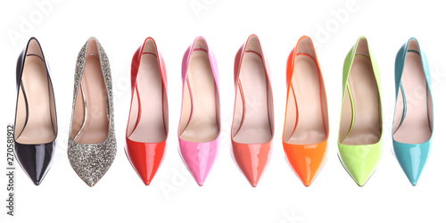 Set of multicolored female shoes on white background. Flat lay, top view. Fashion feminine background