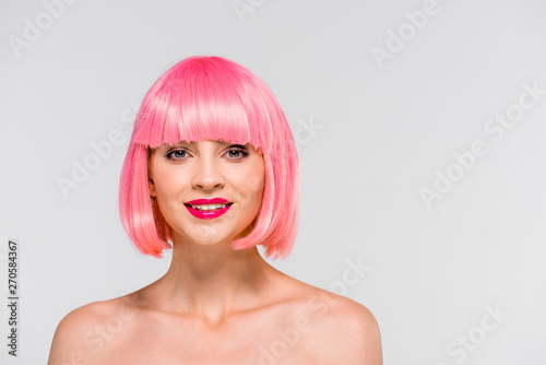 happy naked girl in pink wig isolated on grey