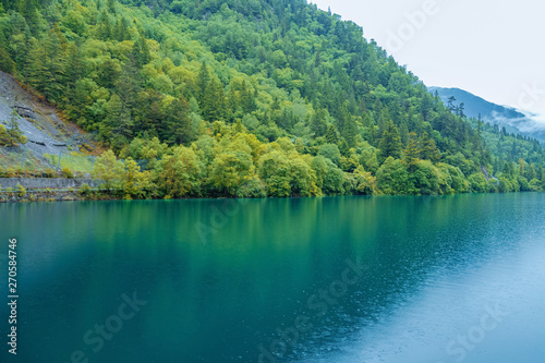 Jiuzhaigou scenery, China - June 15, 2017: this is located in China's jiuzhaigou scenic area, a famous tourist destination in China.Most of it is pristine.The color of the lake is the color of nature.