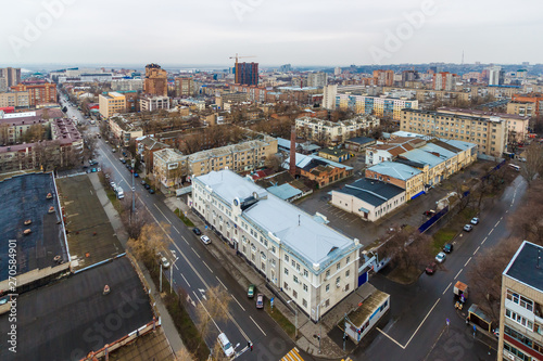 Rostov-on-Don / Russia - 30 march 2019. Aerial view of the city center with residential and commercial buildings in wet rainy weather