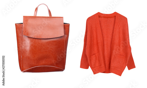 Outfit of casual woman. Orange sweater, leather backpack isolated on white background. Top view. Orange colors fashion set