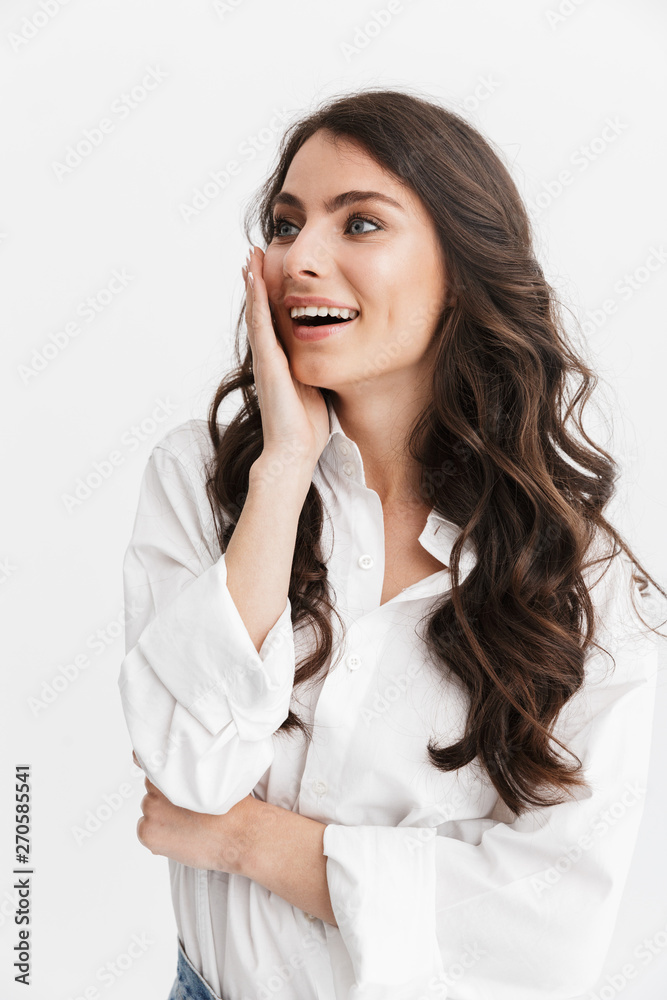 Beautiful young woman with long curly brunette hair Beautiful young woman with long curly brunette hair