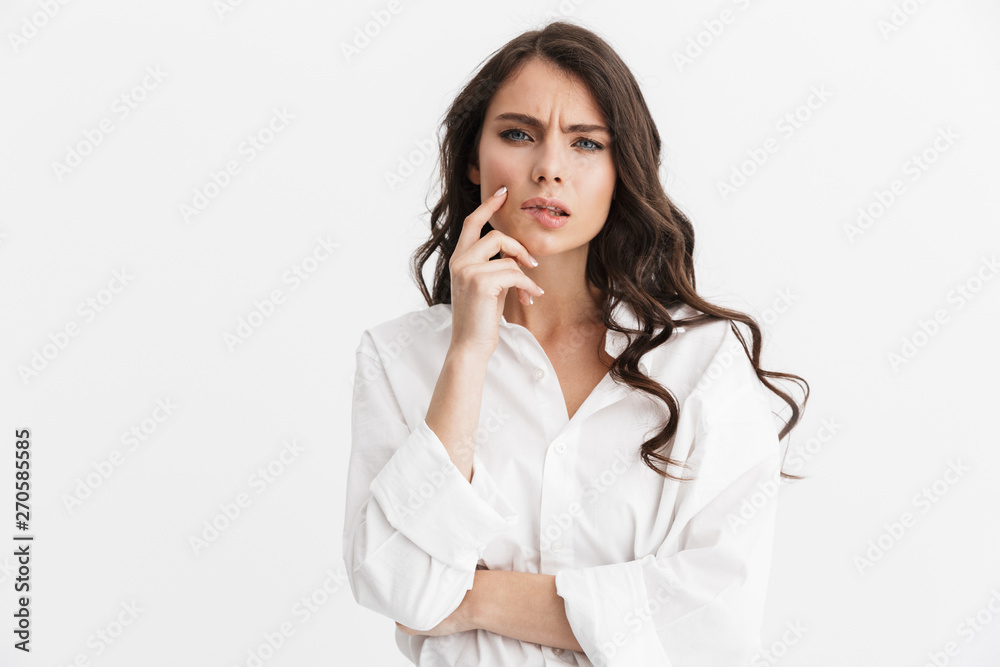 Beautiful young woman with long curly brunette hair Beautiful young woman with long curly brunette hair