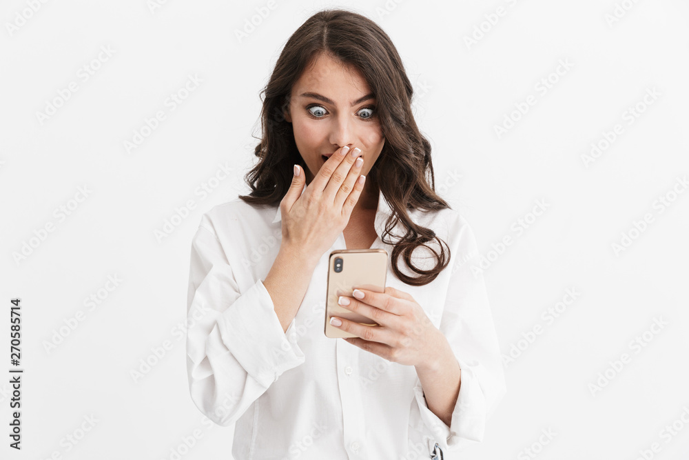 Beautiful young woman with long curly brunette hair