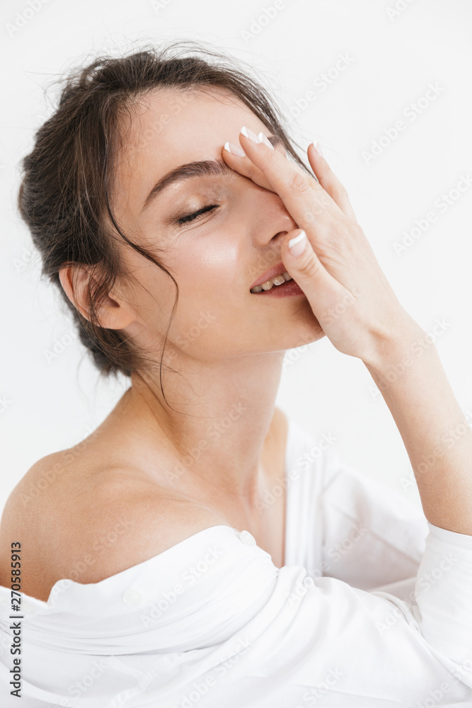 Beautiful young woman with long curly brunette hair Beautiful young woman with long curly brunette hair