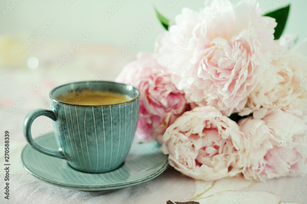 Cup of coffee with peony Cup of coffee with peony
