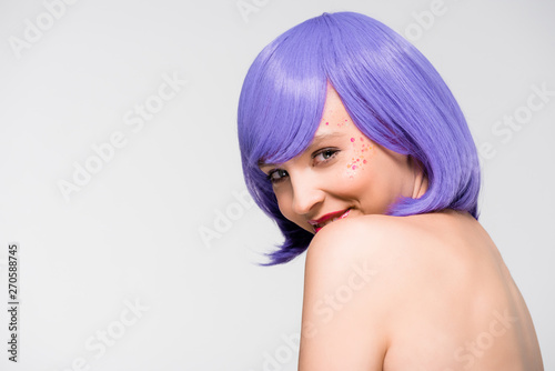 fashionable naked girl in purple wig isolated on grey