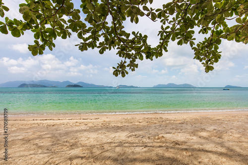 Fototapeta Naklejka Na Ścianę i Meble -  White sand and blue sky in tropical beach in  Koh Wai island, Trat province,Thailand