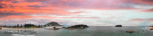 Mount Maunganui, New Zealand. Panoramic aerial view of beautiful seascape at sunset photo