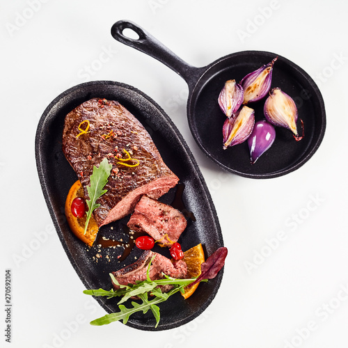 Tender medium rare roasted venison fillet photo