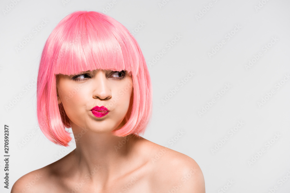 thoughtful naked girl in pink wig isolated on grey