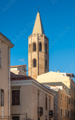 Gothic bell tower of the cathedral of Alghero (L'Alguer), province of Sassari , Sardinia, Italy.  Famous for the beauty of its coast and beaches and its historical city center. 