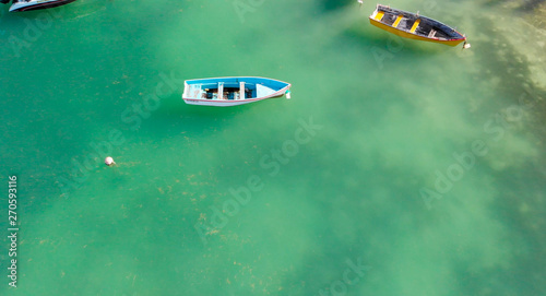 Wooden boats over the ocean, aerial view