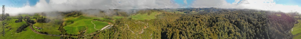 Huka Falls, New Zealand. Panoramic aerial view of beautiful waterfalls and countryside at sunset