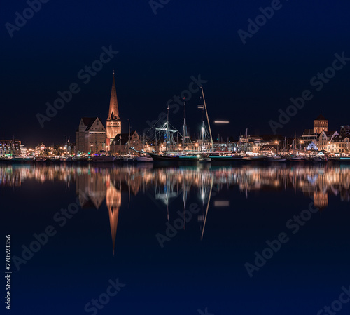 Rostock night panoramic. Warnow canal with ships and Baltic Sea in Rostock Germany in Hanse Sail Festive