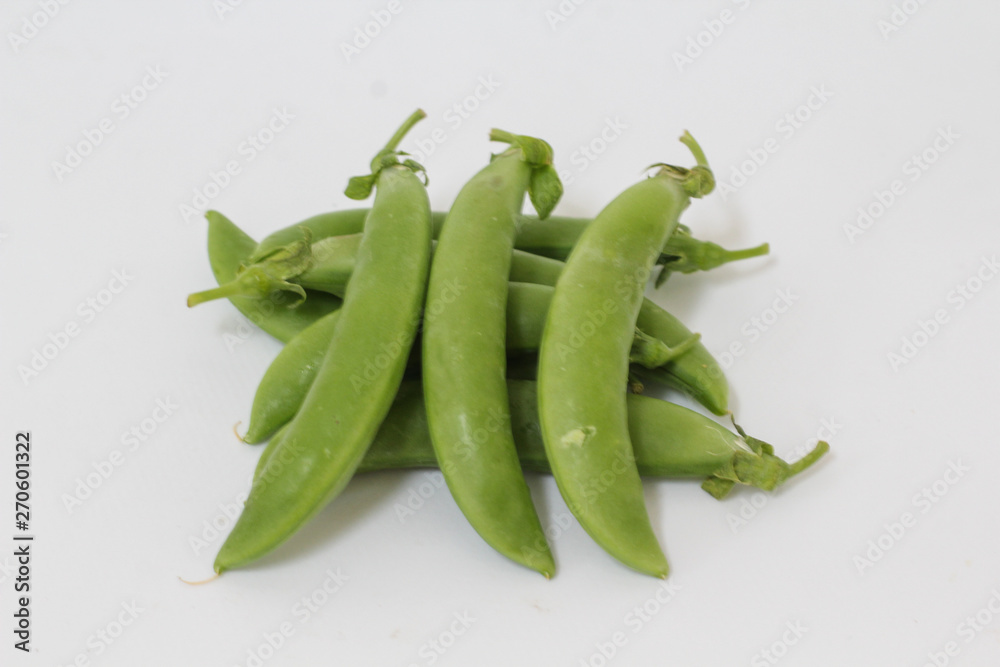 green peas on white background green peas on white background