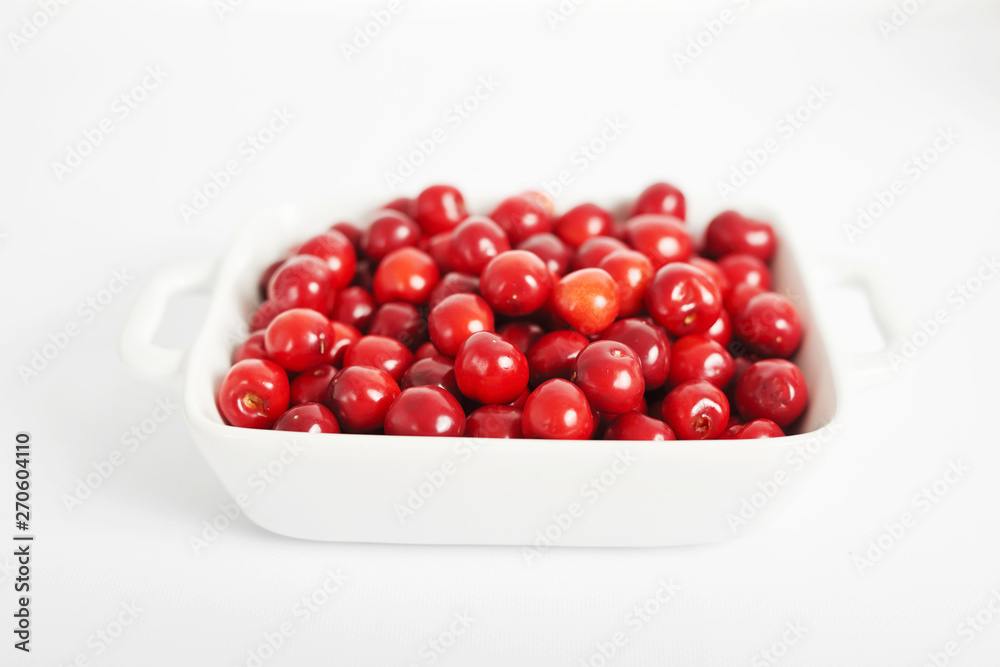 healthy food, sweet cherry on a white background, food for vegetarians and vegans