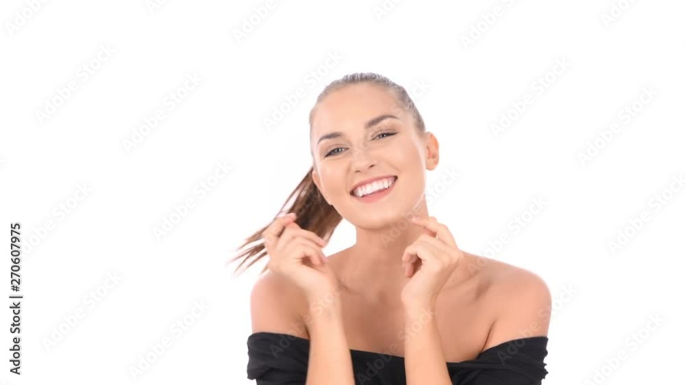Holiday concept. The girl is dancing according to the rhythm of the song on a white background. Holiday concept. The girl is dancing according to the rhythm of the song on a white background.