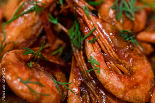 Prepared shrimps with dill close up texture background