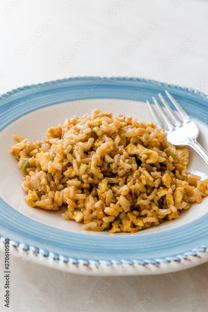 Risotto Rice with Soy Sauce and Egg usually served with White Wine.