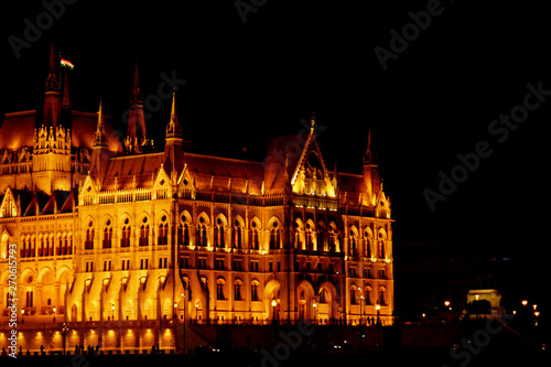Budapest Hungary, 05.29.2019 Hungarian Parliament Building. night Budapest, glowing in gold. facade and roof of an old building